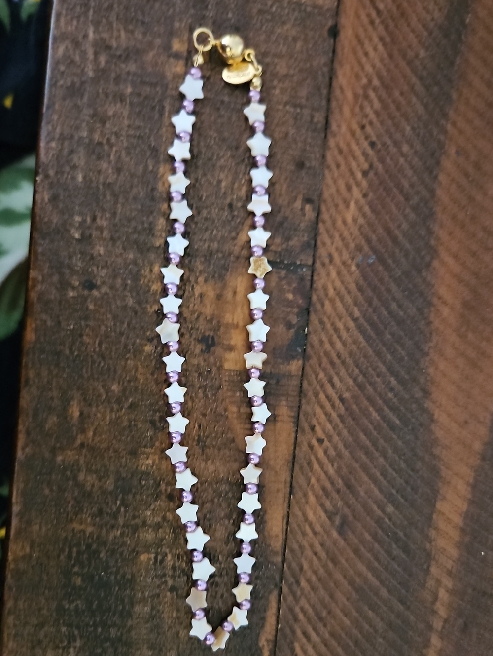 Gold-toned Star Necklace mother of pearl stars with purple beads